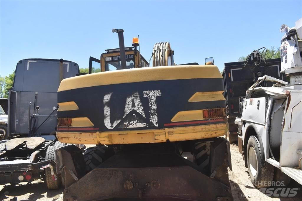 CAT M318 Wielgraafmachines