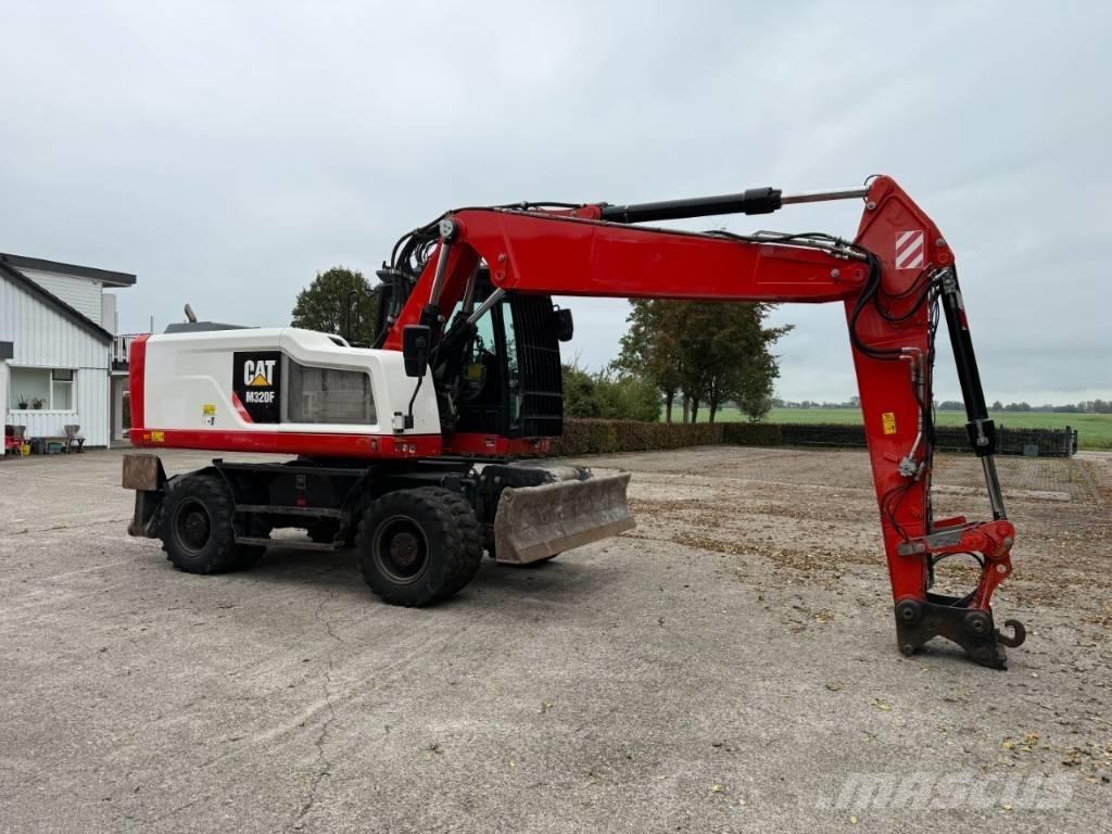 CAT M320F Wielgraafmachines