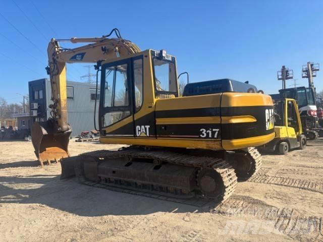 CAT 317 B L Rupsgraafmachines