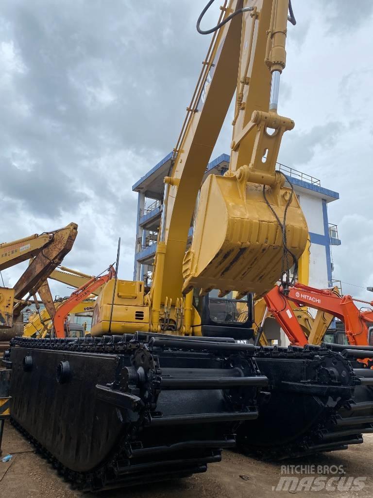 CAT 320 C Amfibische graafmachines