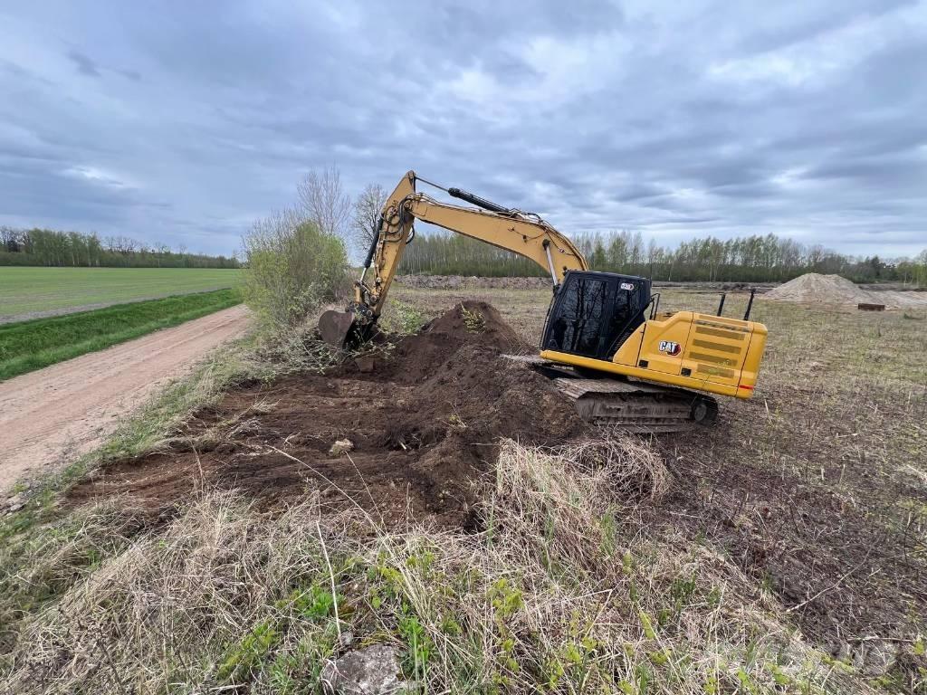 CAT 320 C Rupsgraafmachines