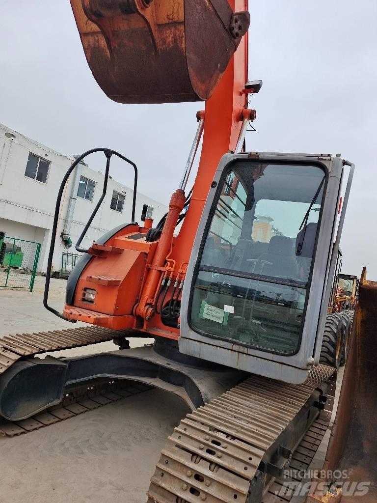 Hitachi ZX 135 US Rupsgraafmachines