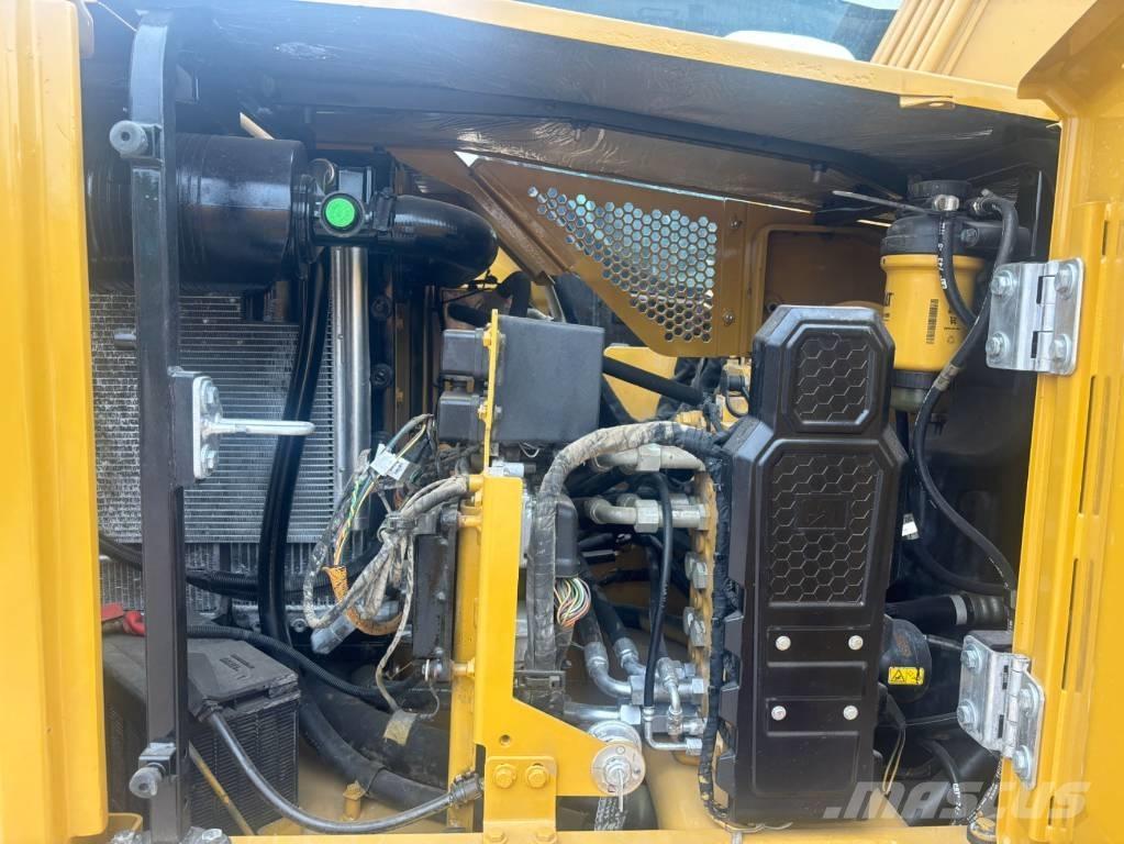 CAT 310 Rupsgraafmachines