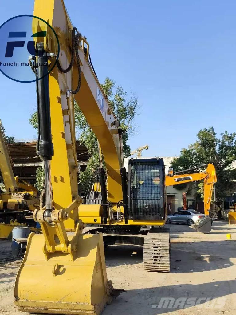 CAT 323 Rupsgraafmachines