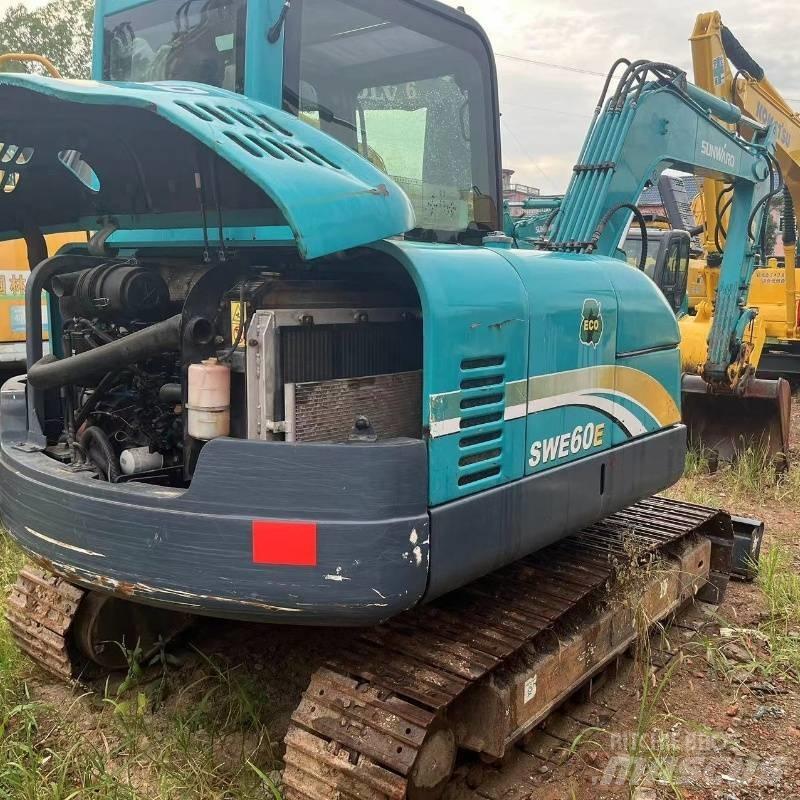 Sunward SWE 60 Rupsgraafmachines