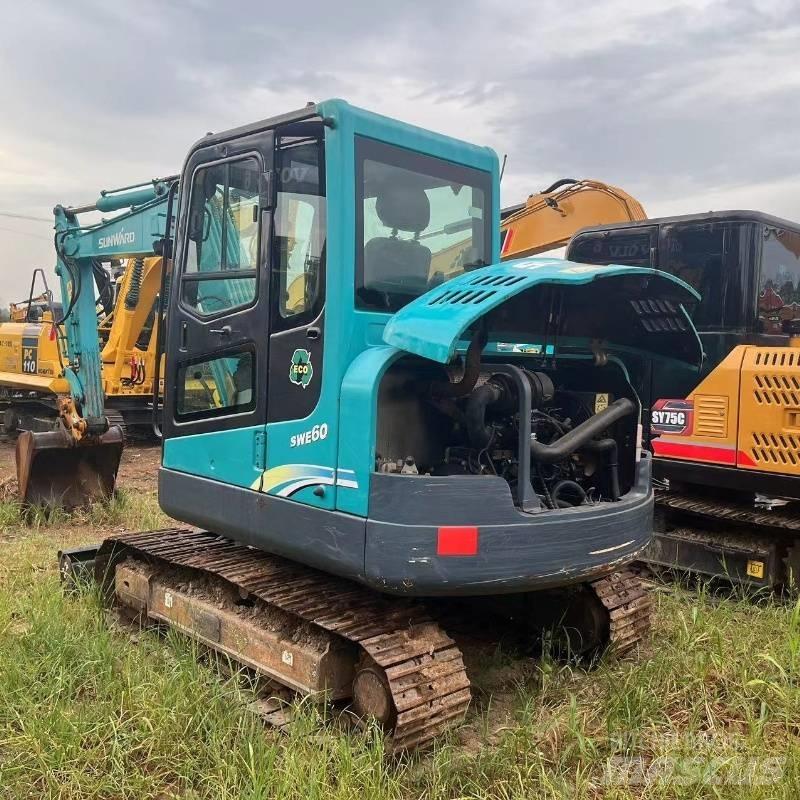 Sunward SWE 60 Rupsgraafmachines
