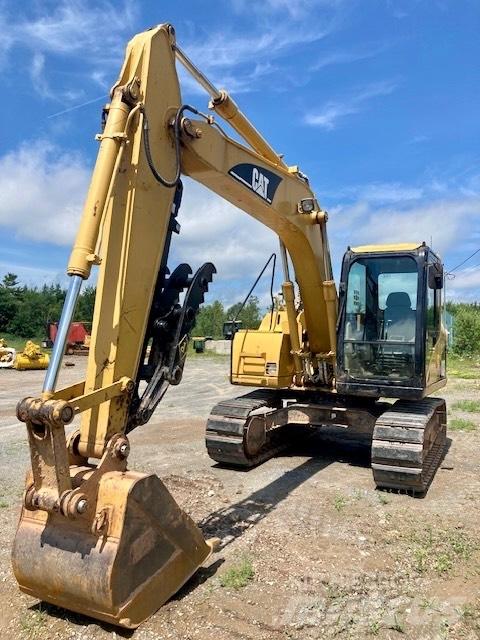 CAT 311 C Rupsgraafmachines