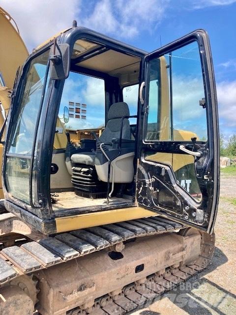 CAT 311 C Rupsgraafmachines
