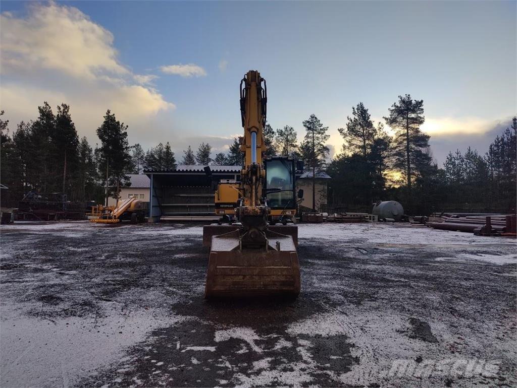 CAT M315 Wielgraafmachines