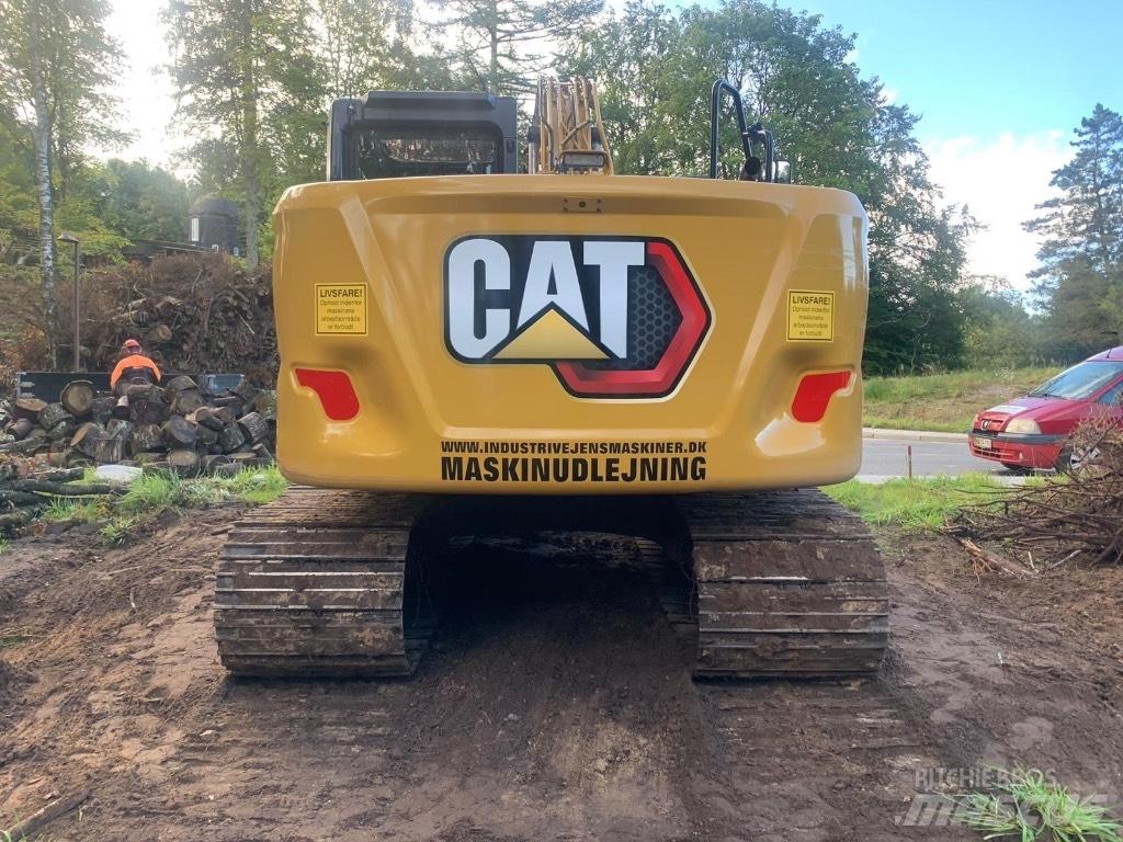 CAT 313 Rupsgraafmachines