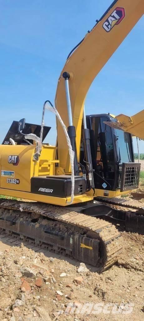 CAT 313 Midigraafmachines 7t - 12t