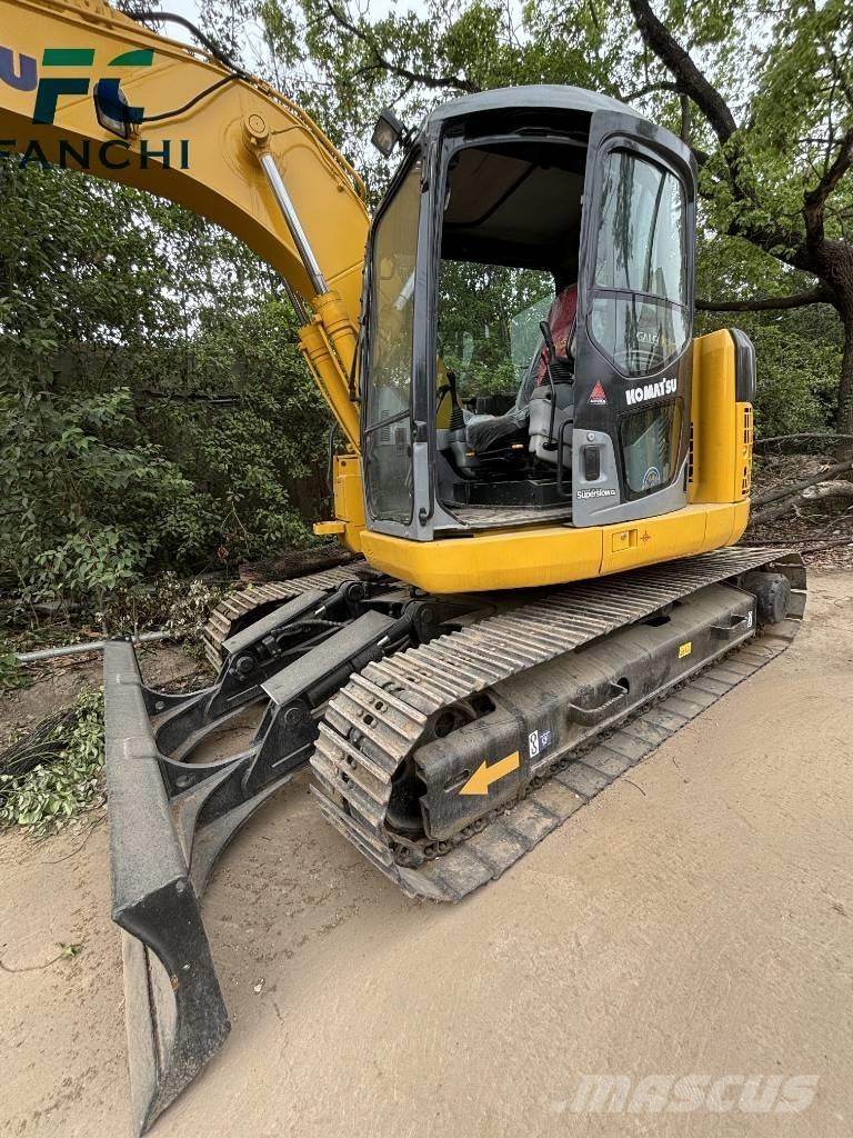 Komatsu PC128US Rupsgraafmachines