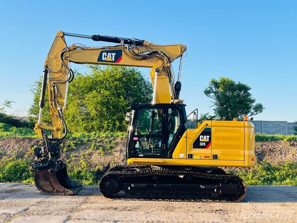 CAT 323 Rupsgraafmachines