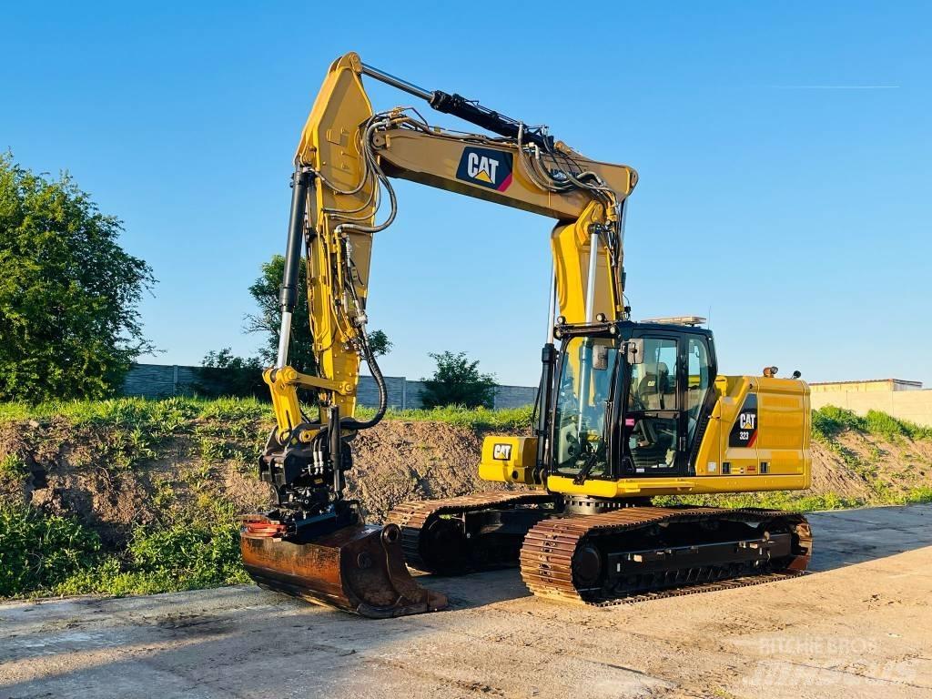 CAT 323 Rupsgraafmachines