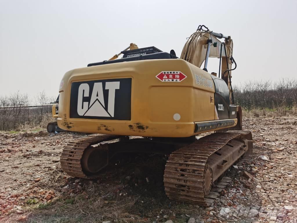 CAT 323 D L Rupsgraafmachines