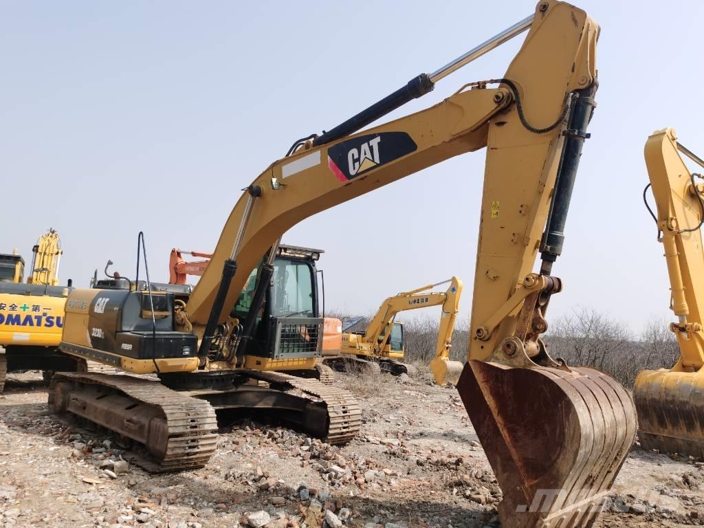 CAT 323 D L Rupsgraafmachines