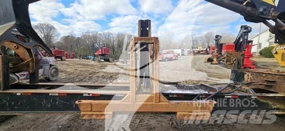 CAT 559C Boomstamladers