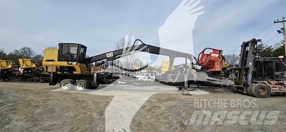 CAT 559D Boomstamladers