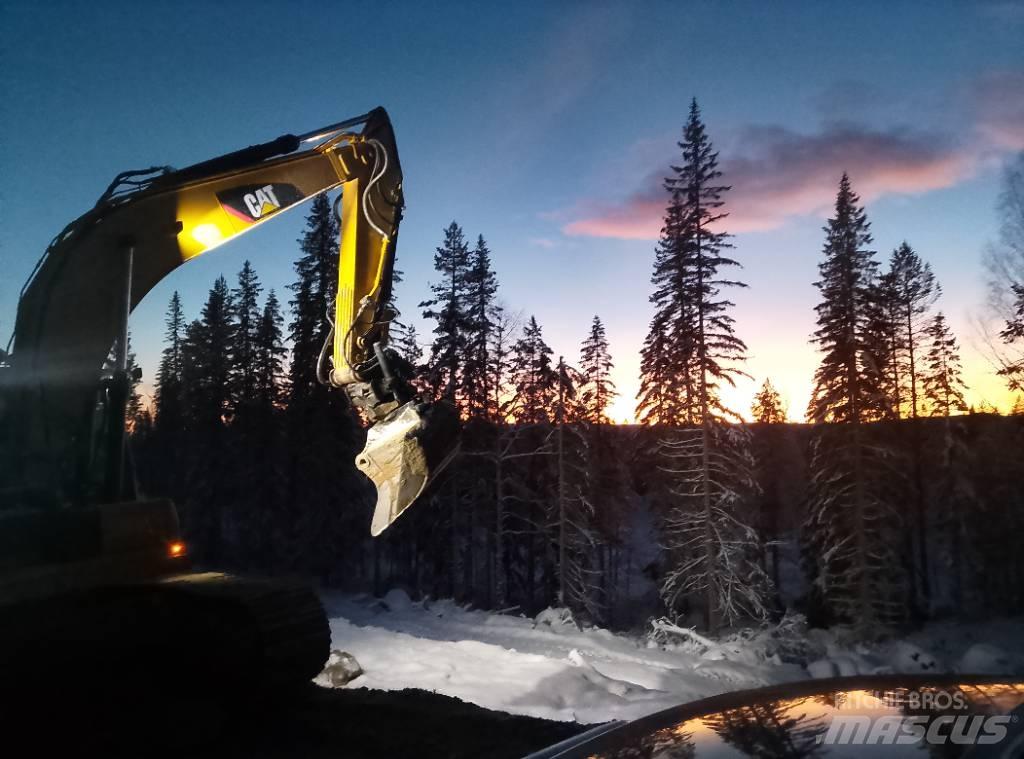 CAT 320 Rupsgraafmachines