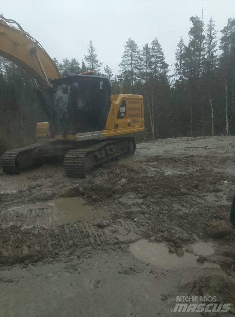 CAT 320 Rupsgraafmachines