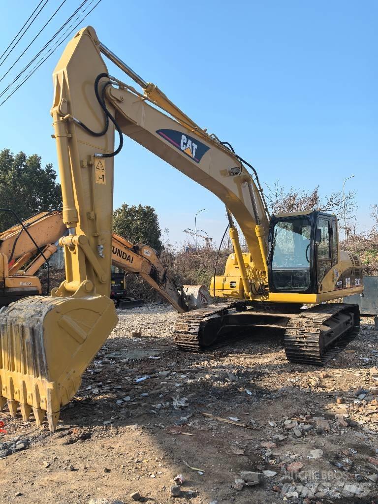 CAT 320 Rupsgraafmachines