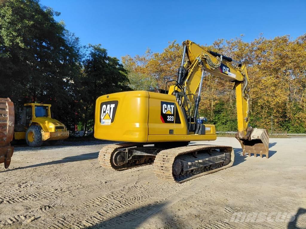 CAT 323 Rupsgraafmachines
