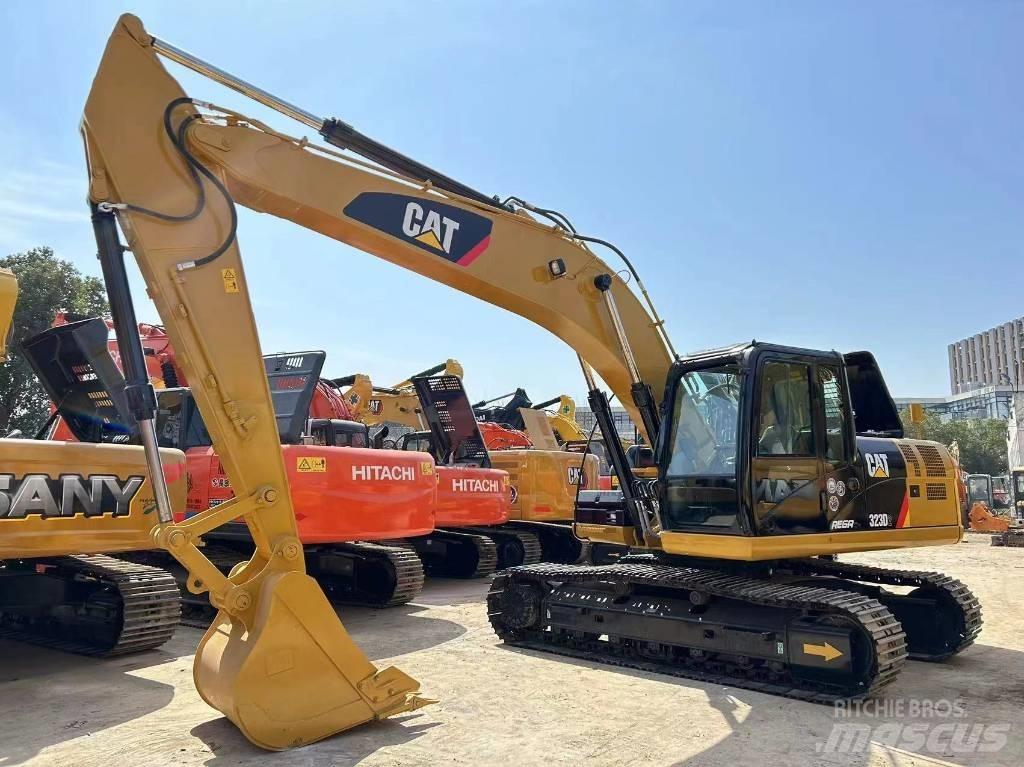 CAT 323 D Rupsgraafmachines