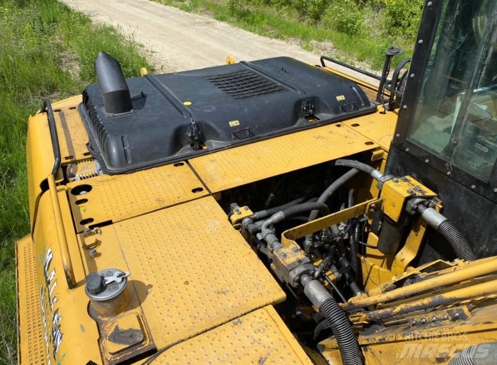 CAT 320 D FM Boomstamladers