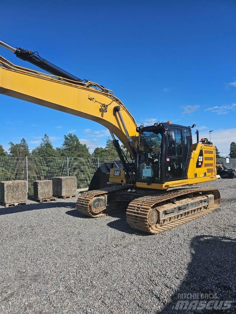 CAT 323 Rupsgraafmachines