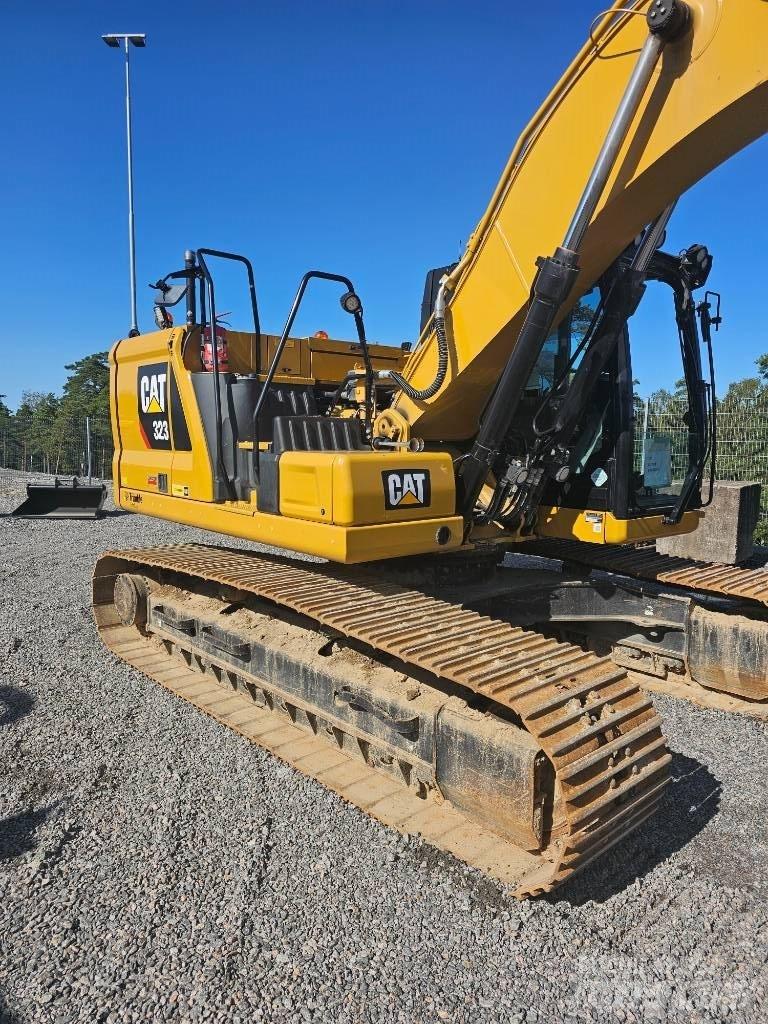 CAT 323 Rupsgraafmachines