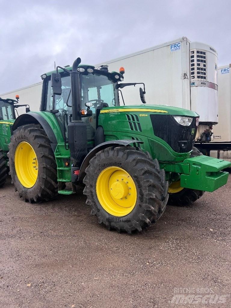 John Deere 6195M Tractoren