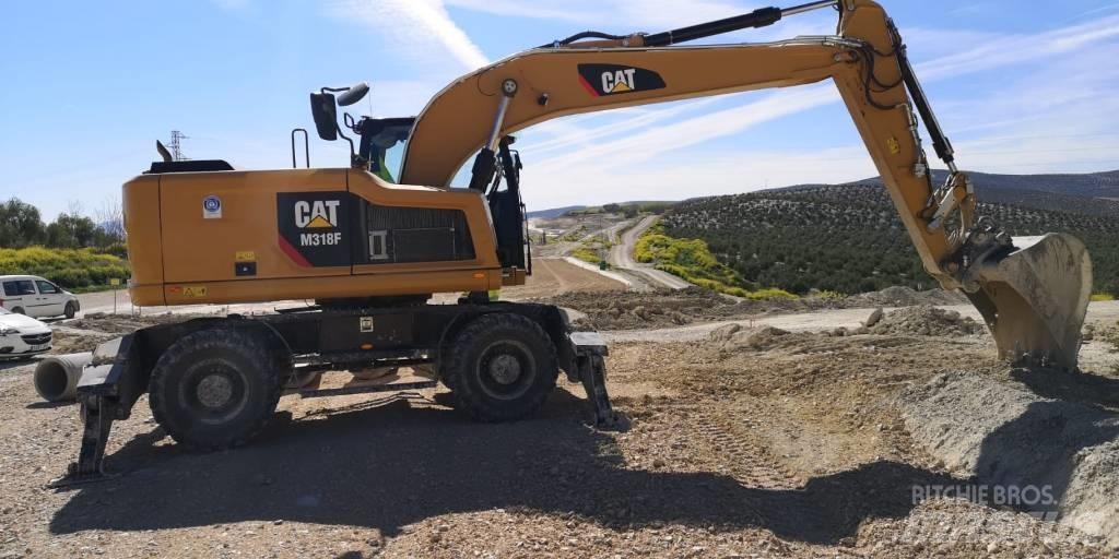 CAT M318F Wielgraafmachines