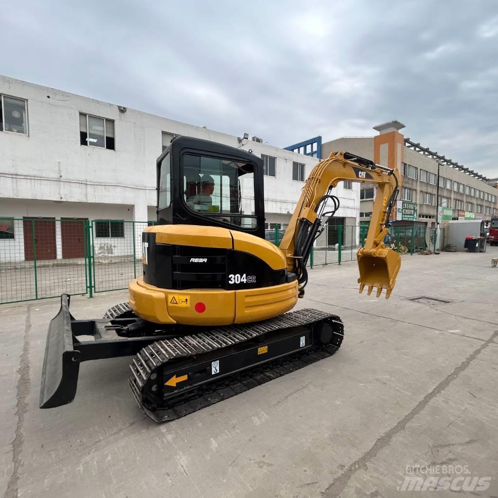 CAT 304 Rupsgraafmachines