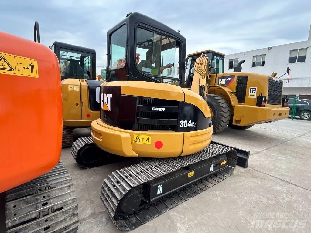 CAT 304 Rupsgraafmachines