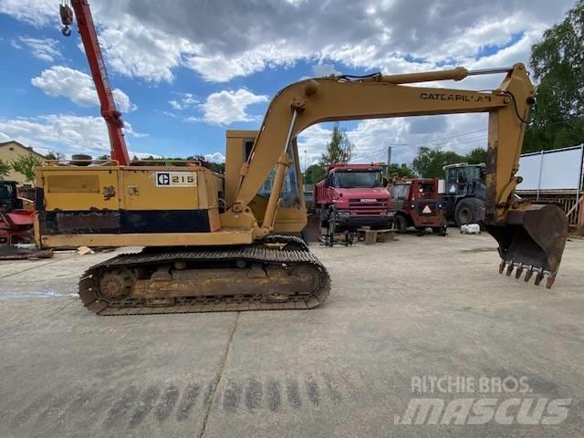 CAT 215 Rupsgraafmachines