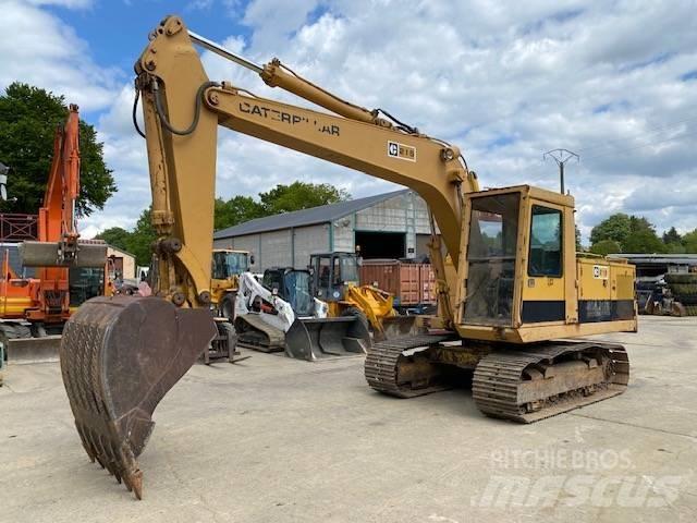 CAT 215 Rupsgraafmachines
