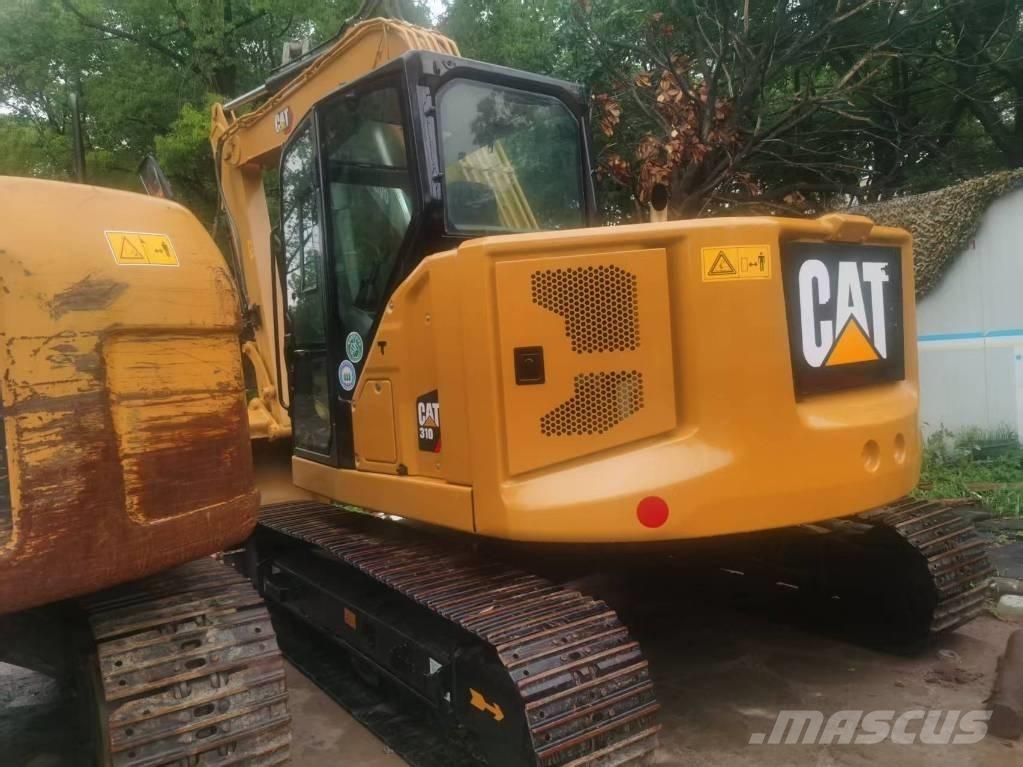 CAT 310 Rupsgraafmachines