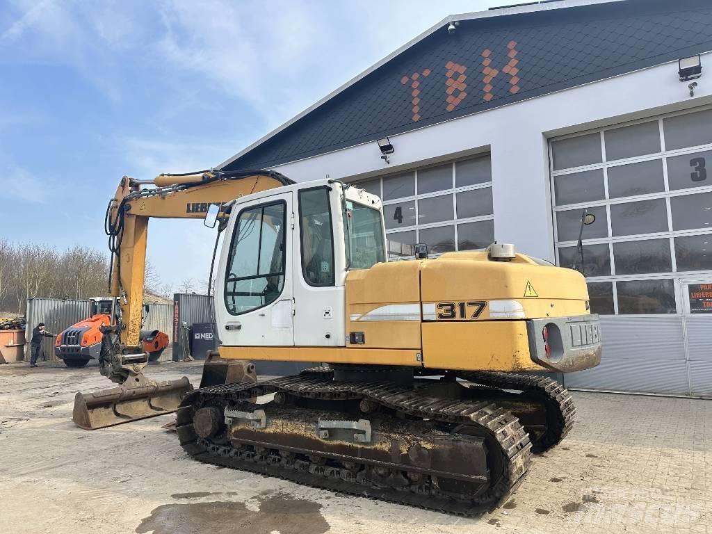 Liebherr R 317 Rupsgraafmachines