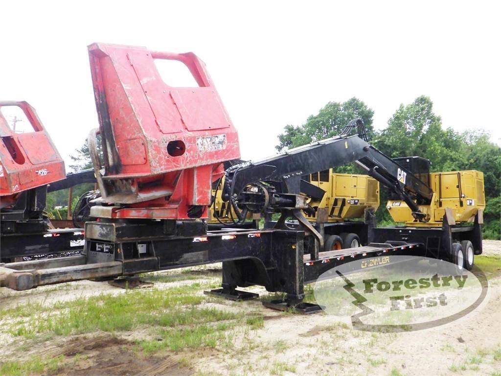 CAT 559D Boomstamladers