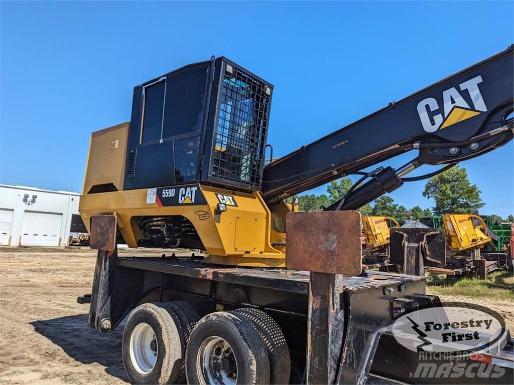 CAT 559D Boomstamladers