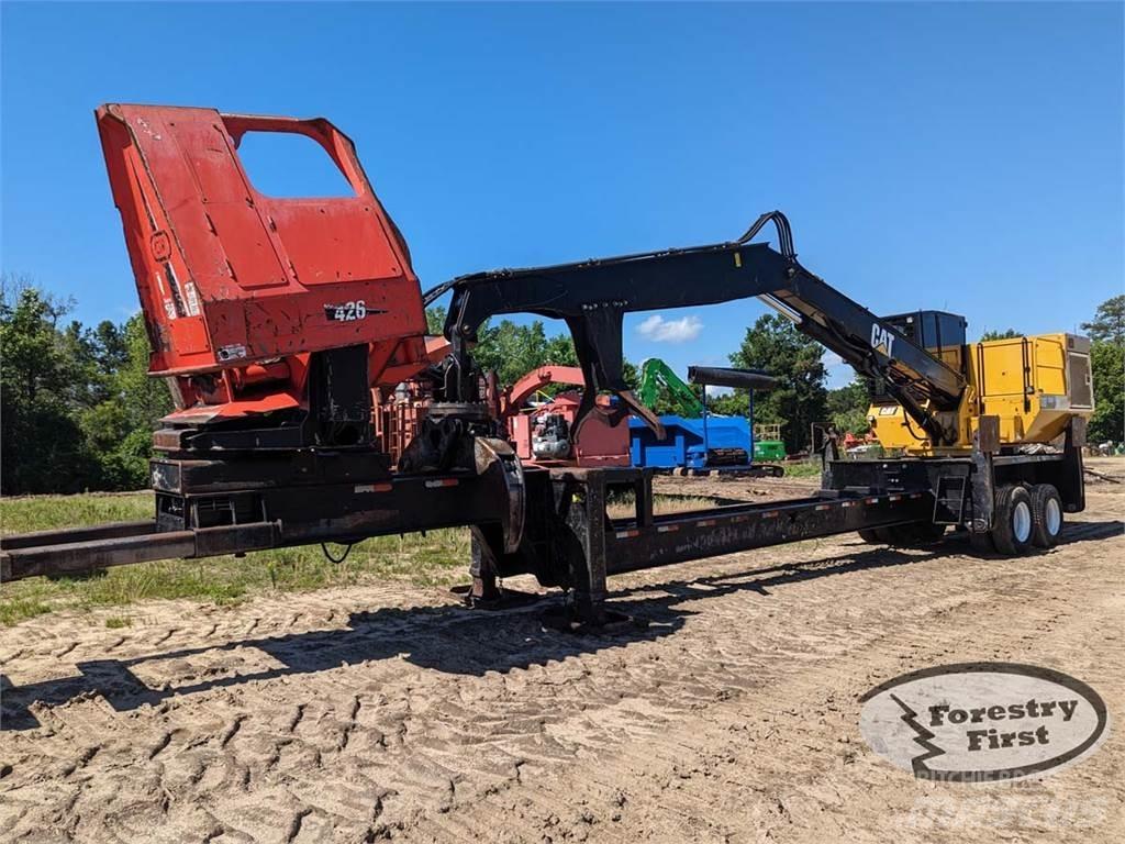 CAT 559D Boomstamladers