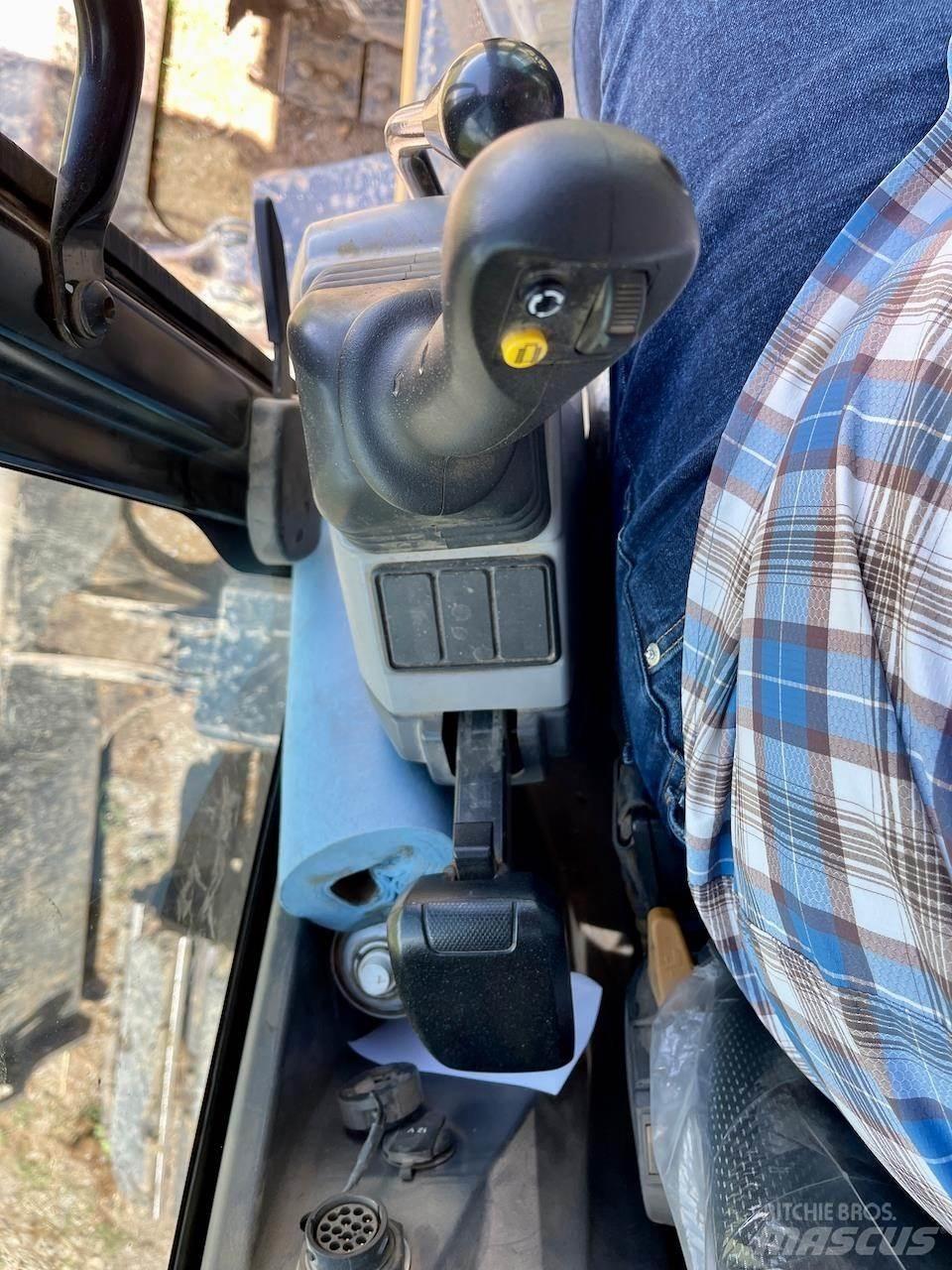 CAT 310 Rupsgraafmachines