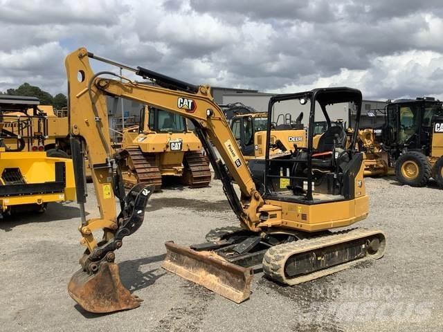 CAT 304 Rupsgraafmachines