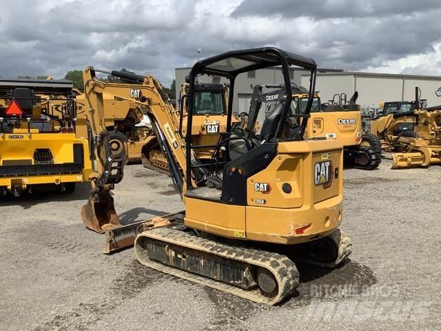 CAT 304 Rupsgraafmachines