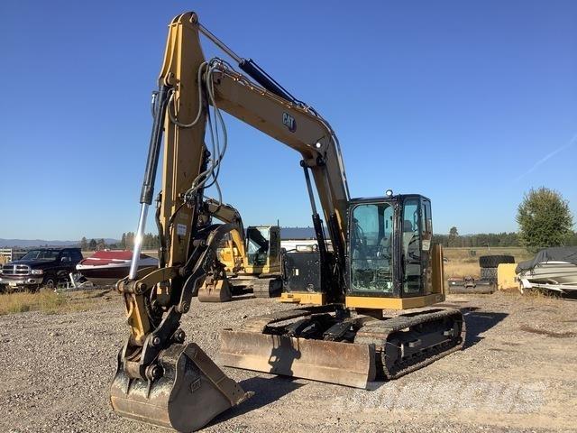 CAT 310 Rupsgraafmachines