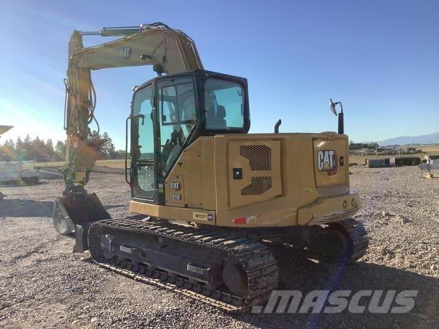 CAT 310 Rupsgraafmachines