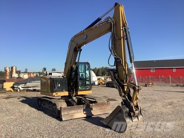 CAT 310 Rupsgraafmachines