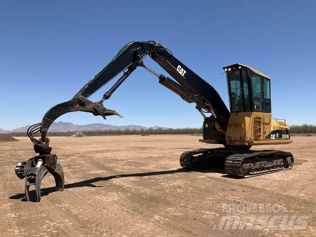 CAT 320C Boomstamladers