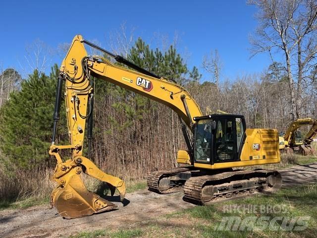 CAT 323 Rupsgraafmachines