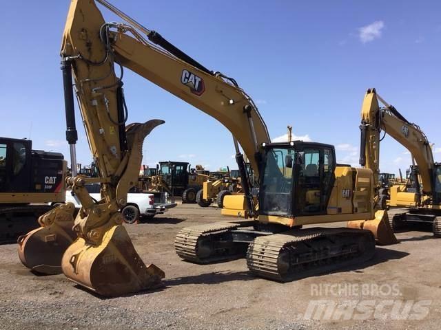 CAT 323 Rupsgraafmachines